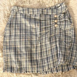 Tweed mini skirt with Pearl buttons
